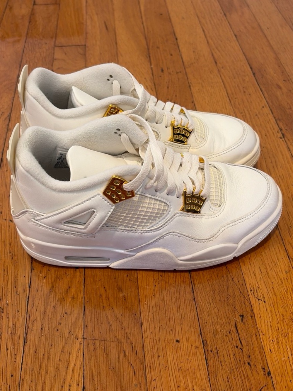 Jordan 4’s White and Gold Air Jordan Sneakers